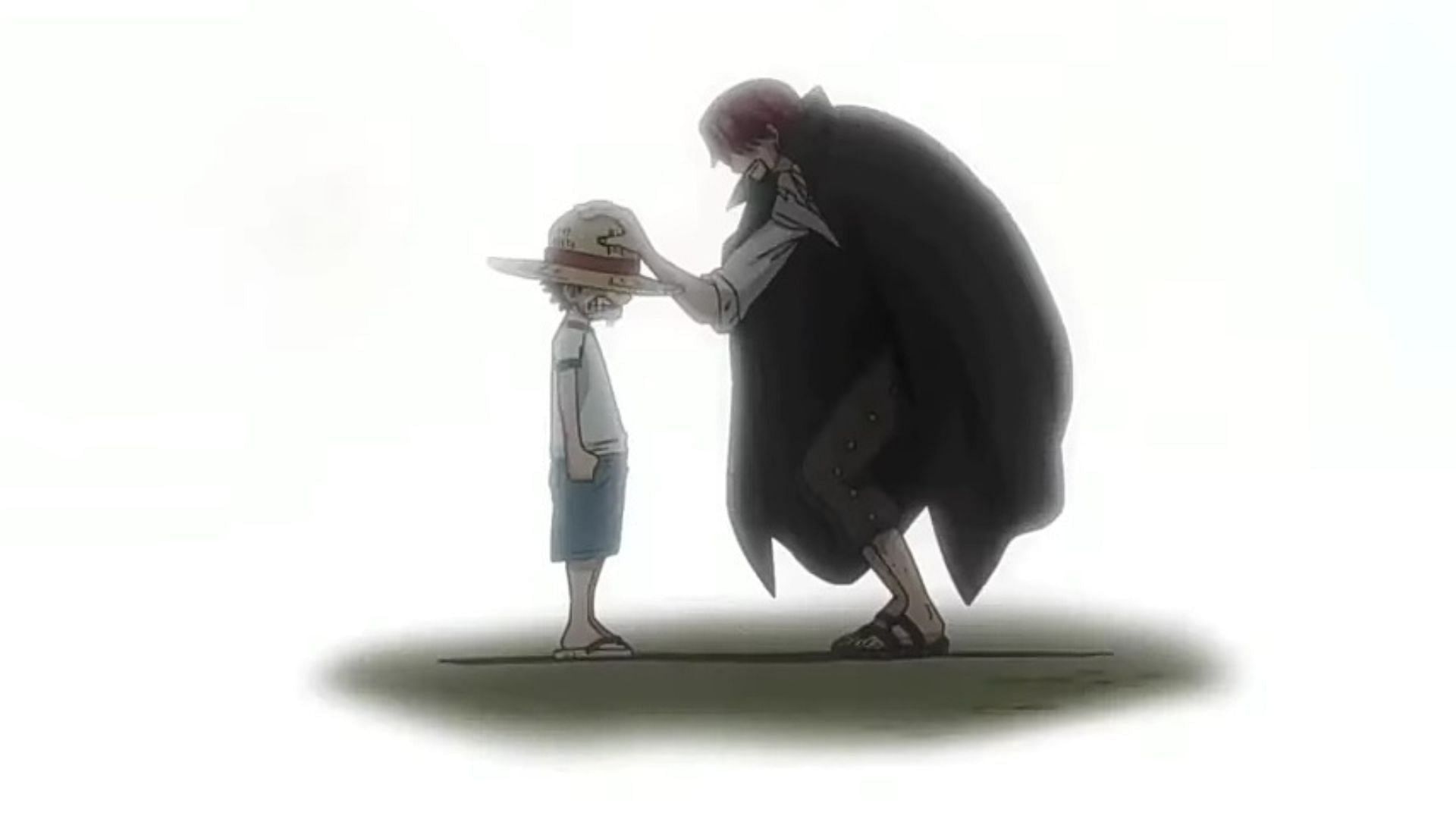 Shanks donnant son chapeau de paille à Luffy comme on le voit dans l'anime One Piece (Image via Toei Animation)